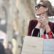 photo of a woman holding shopping bags