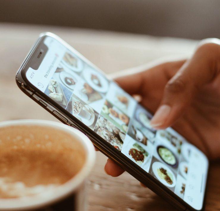 selective focus photography of person using iphone x