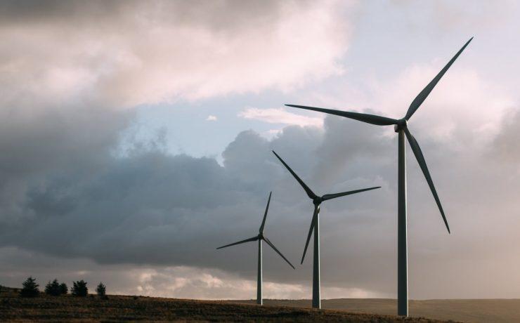 three gray wind turbine