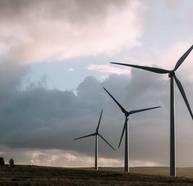 three gray wind turbine