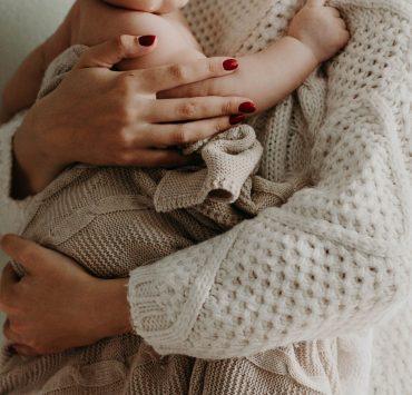 mother holding her baby