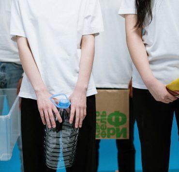 people holding diy masks