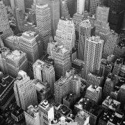aerial view and grayscale photography of high rise buildings