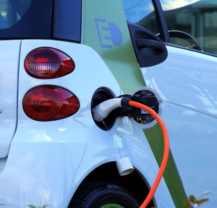 white and orange gasoline nozzle