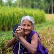 smiling woman at the field