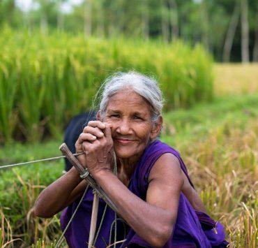 smiling woman at the field