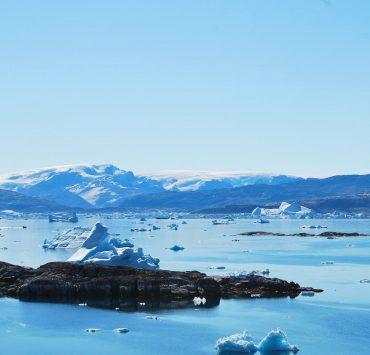 icy mountain and ocean scenery