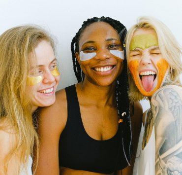 photo of women doing their skincare