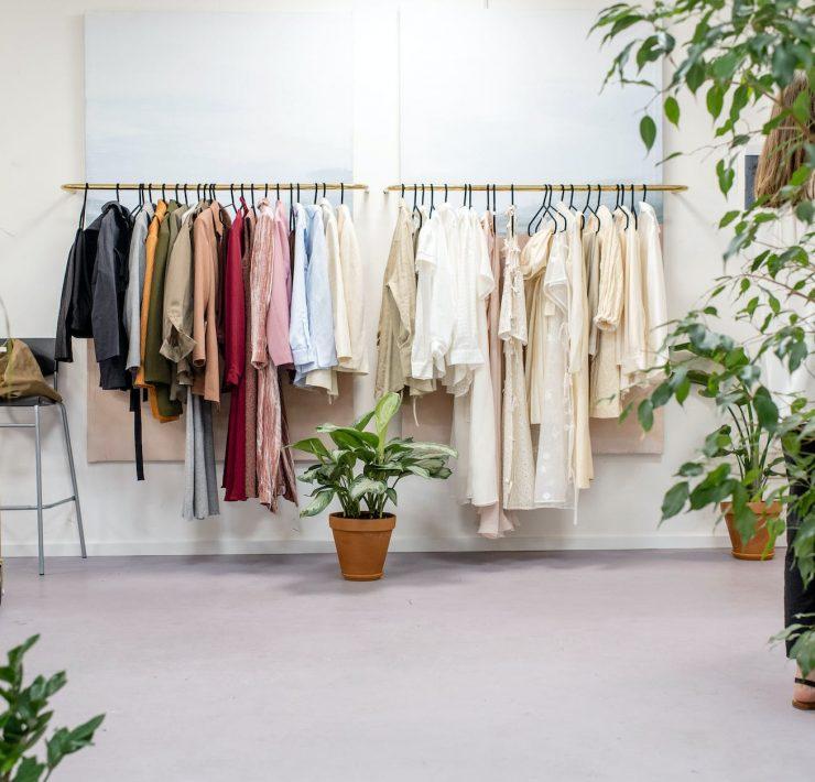 clothes hanged on clothes rack