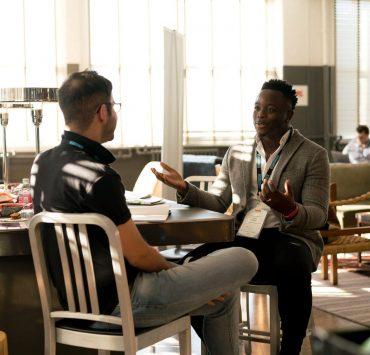 photo of men having conversation