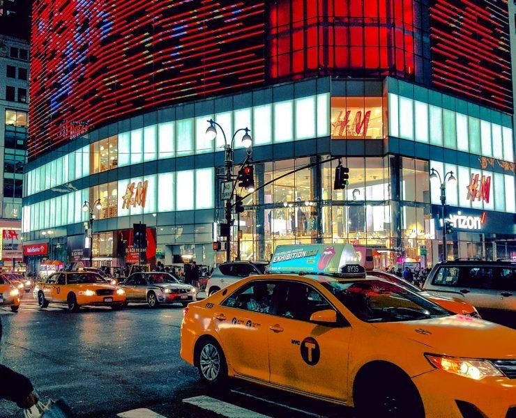 time lapse phot oof a yellow car