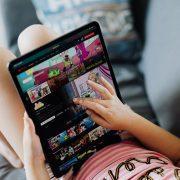 little girl holding a tablet