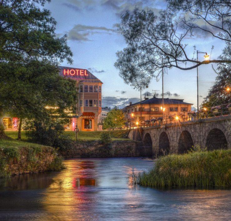 river near bridge beside hotel