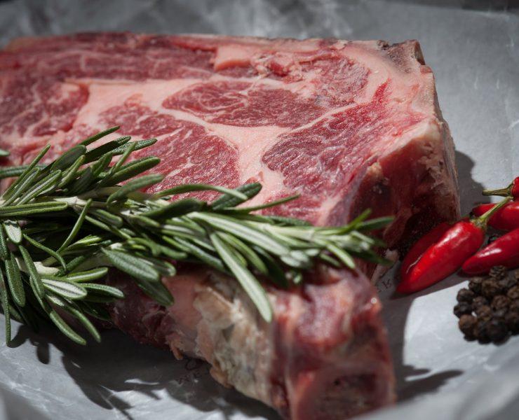 red meat with chili pepper and green spies