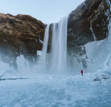 person walking on snowfield