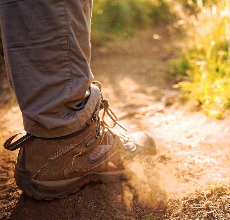 person wearing pair of brown sneakers