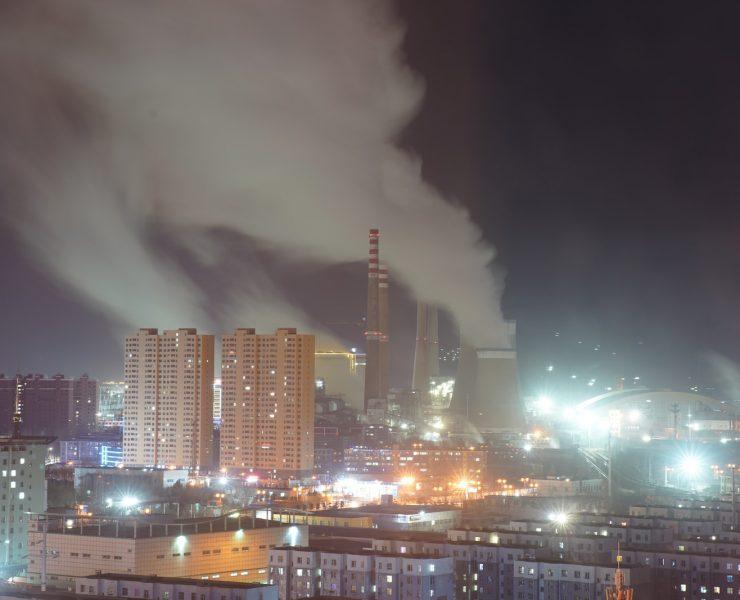 city skyline with lights turned on during night time