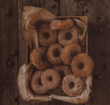 glazed donuts on brown tray