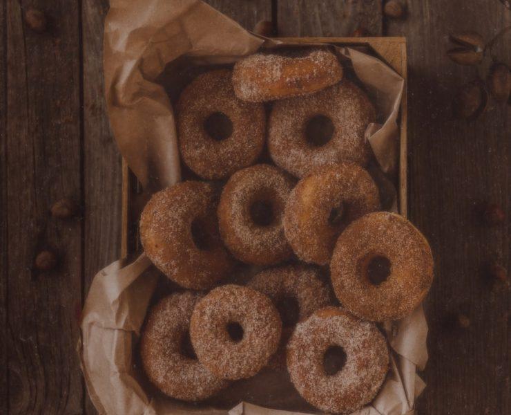 glazed donuts on brown tray