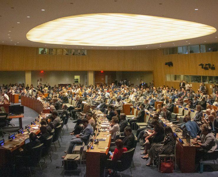 people sitting on chairs inside building