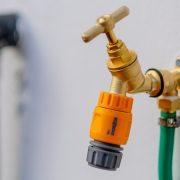 brass-colored faucet