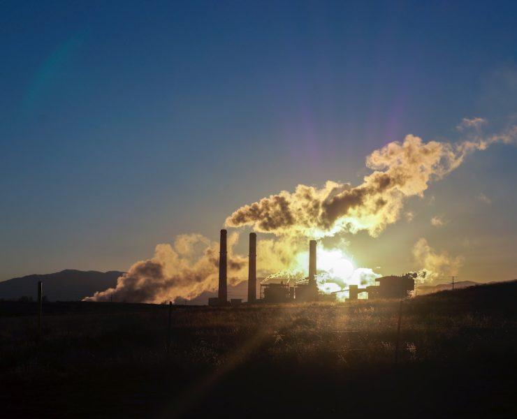 white clouds over city skyline during sunset