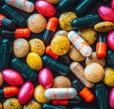 red and brown medication pill