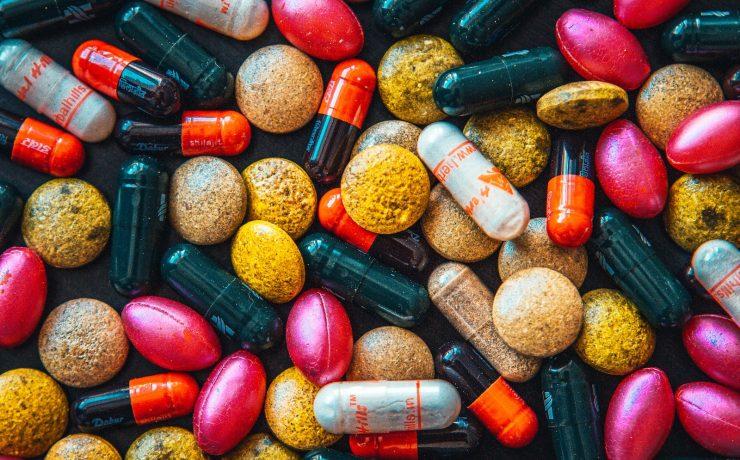 red and brown medication pill