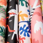 black white blue and pink floral textile