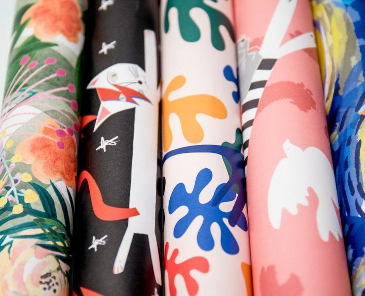 black white blue and pink floral textile