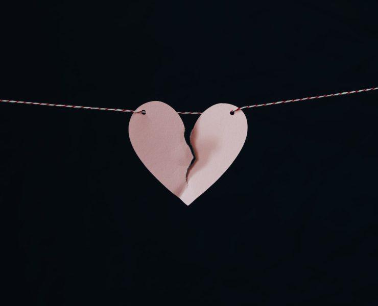 broken heart hanging on wire