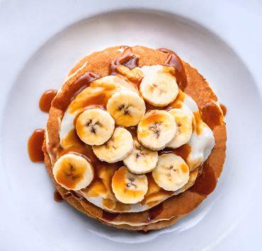 brown and white bread on white ceramic plate