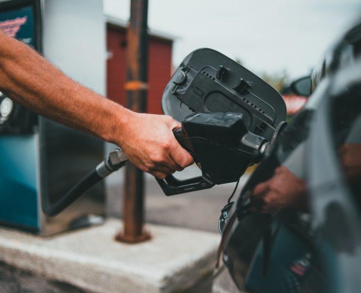 person holding black corded device