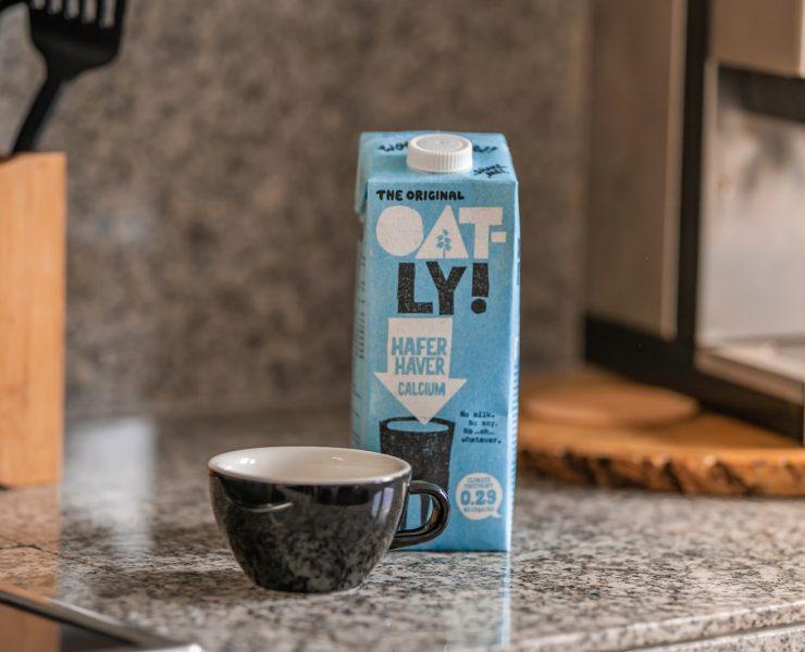 blue and white carton box on gray marble table