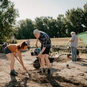 a group of people working outside