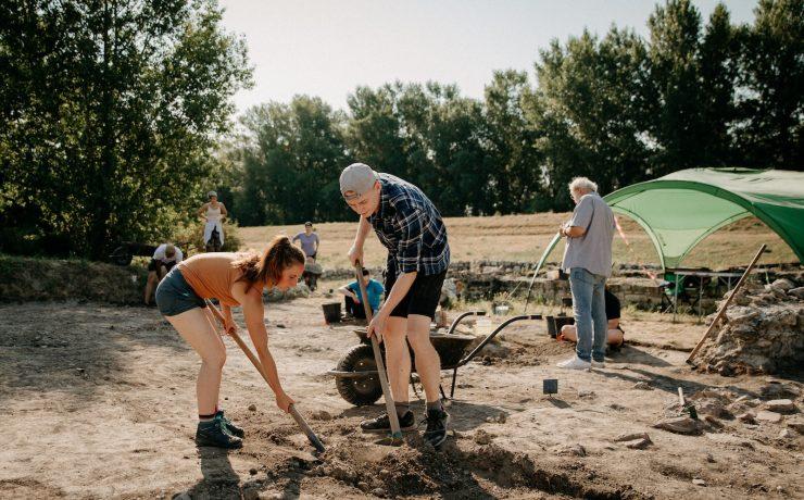 a group of people working outside