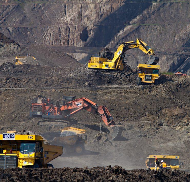 photography of excavators at mining area