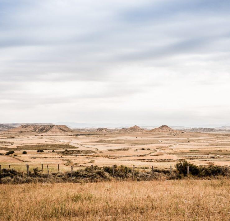 green grass field near mountains