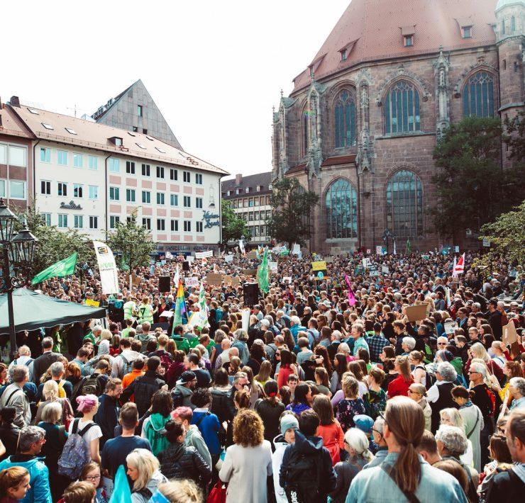 people walking on paved road