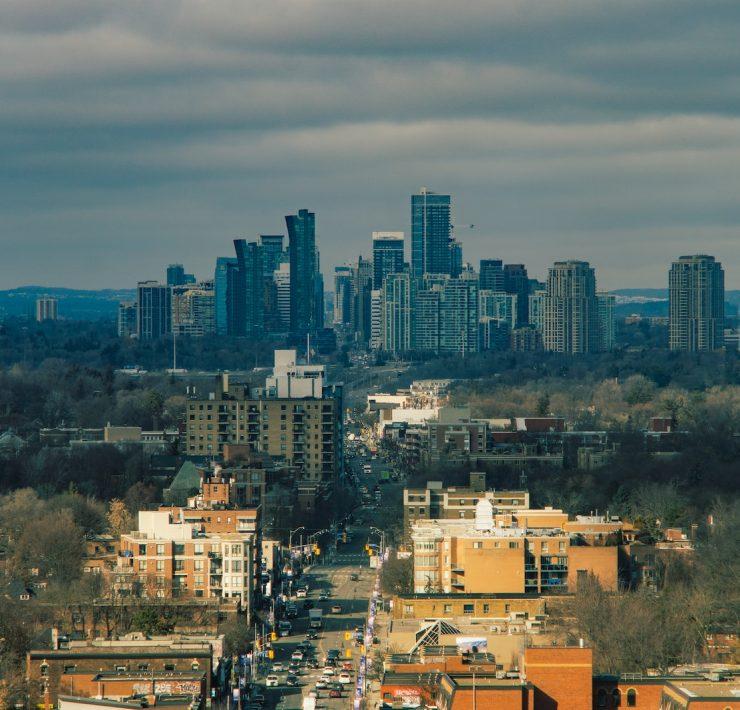city buildings under blue sky during daytime