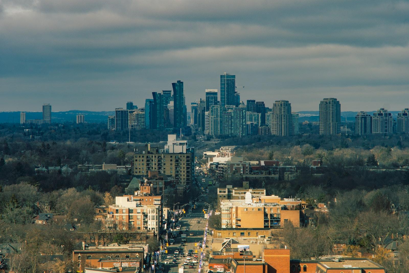 city buildings under blue sky during daytime