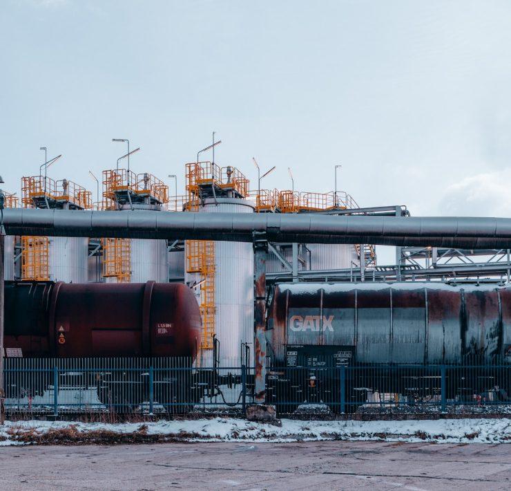 a train on a train track near a building