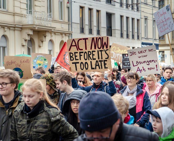 people walking near white concrete building