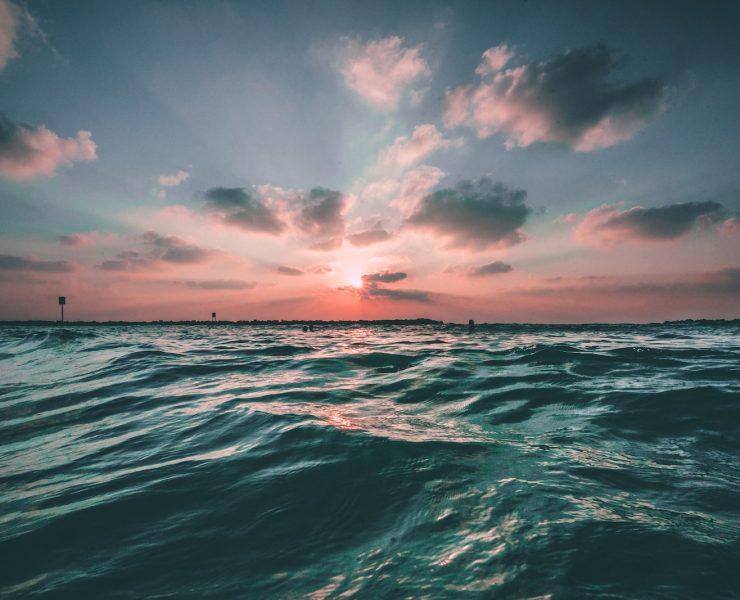 body of water during golden hour