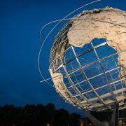 low angle photo of Earth metal statue