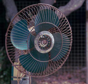 white and blue desk fan