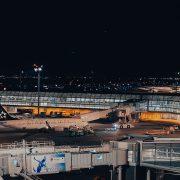 a large jetliner sitting on top of an airport tarmac