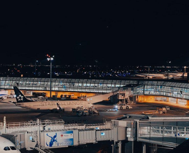 a large jetliner sitting on top of an airport tarmac