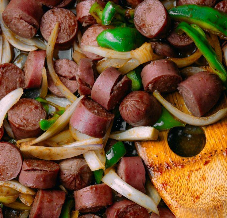 sliced vegetables on brown wooden chopping board