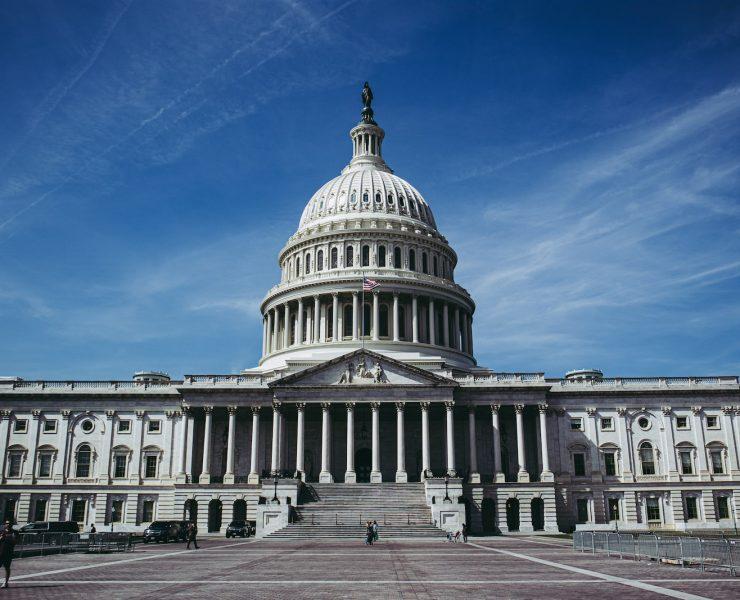 white concrete building under clear blue sky